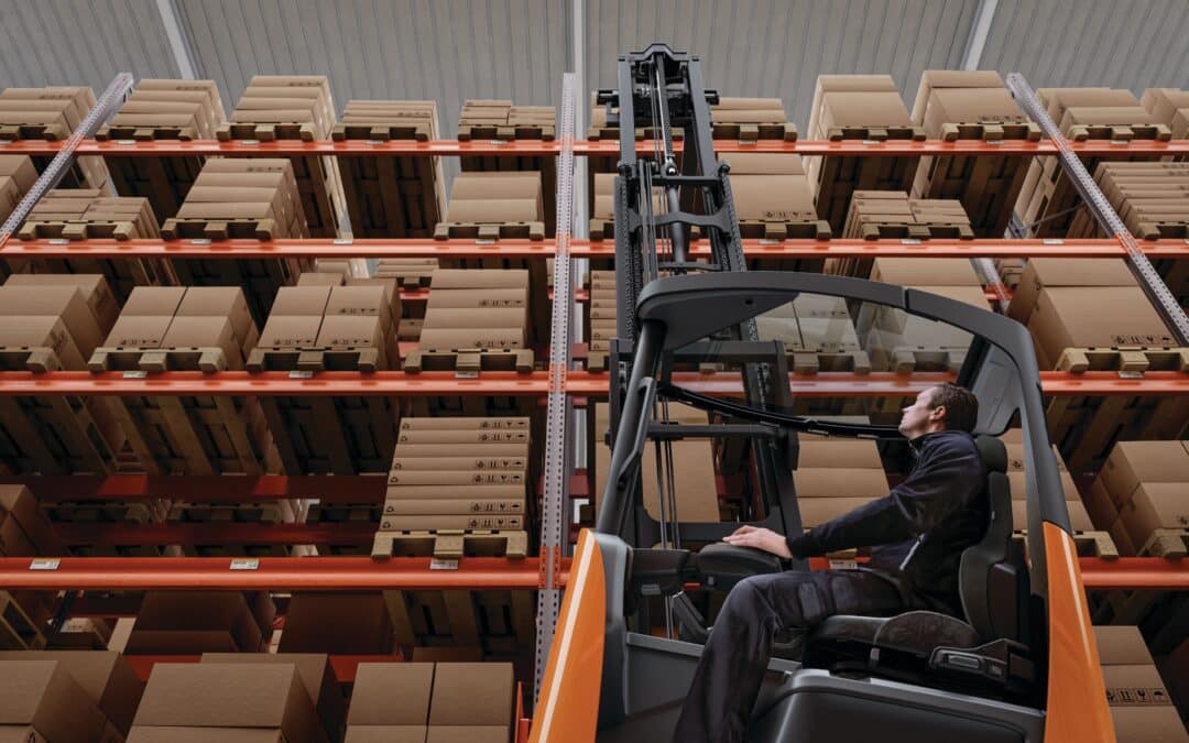 Moving Mast Reach Truck E Application 7 - Copy Choosing the Right Forks for Your Forklift - Shoppa's Material Handling